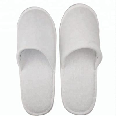 China Home Hotel Spa Disposable Paper Disposable Bath Use White Slippers for sale