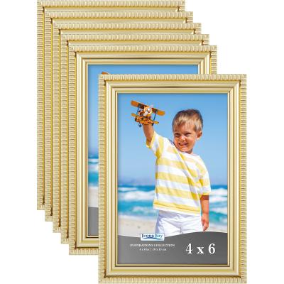 China Modern Hot Selling Fotos Office Wedding 4x6 Modern Cheap Creative Light Weight Golden Adhesive Bulk Photo Frames Picture Frame for sale