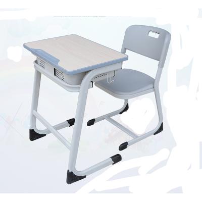 China Environmental friendly latest design comfortable school desk and school chair for sale