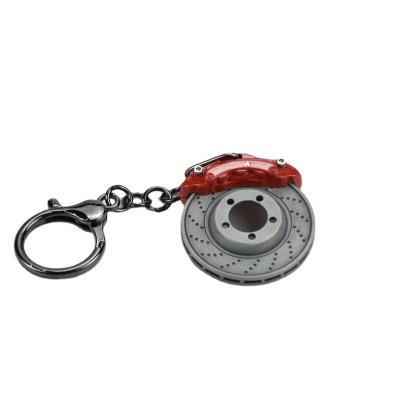 China Promotional custom metal key chain logo disc brake key chain, metal brake guard key chain, car part key chain for sale