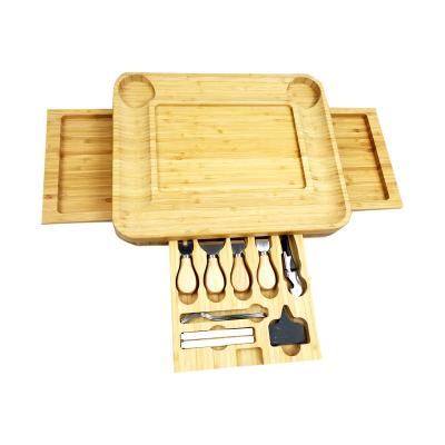 China Biodegradable Bamboo Cheese Stored 3 Drawer With Knife Set Slate Wine Opener Wooden Cutting Board for sale