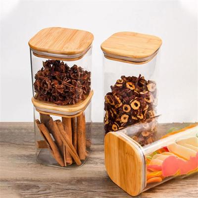 China Tea Glass Nut Spice Borosilicate Kitchen Storage Jar Square Stocked Container with Bamboo Lid for sale