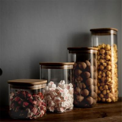 China Wholesale Custom Stocked Printed Circular Borosilicate Glass Spice Jar With Bamboo Lid for sale