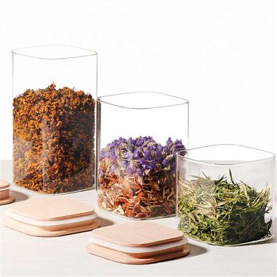 China Wholesale 250ml 500ml 100ml Borosilicate Food Storage Spice Jar Stocked Glass Container With Wooden Bamboo Lids For Amzon for sale