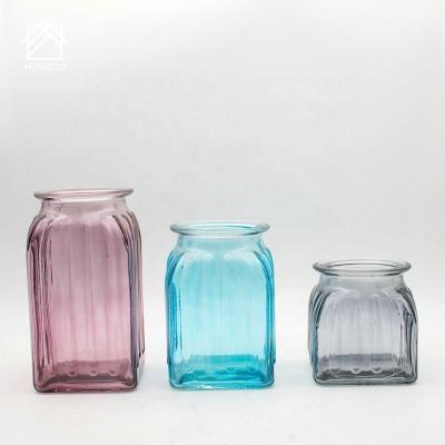 China Contemporary Centerpiece Decorative Colored Clear Glass Flower Vase/Glass Vases for sale