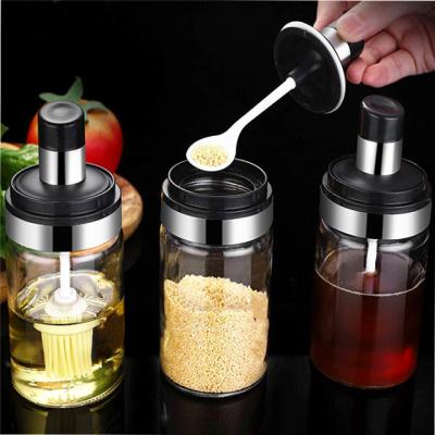 China 250ml Kitchen Stocked Glass Spice Jars Seasonning Box Container Dispenser Bottle Jar For Oil Honey Dispenser With Spoon And Lid for sale