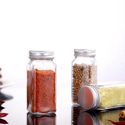 China Stocked 24 Pcs Empty Square Glass Spice Shaker Lids Glass Spice Jars and Airtight Metal Spice Bottle Containers for sale