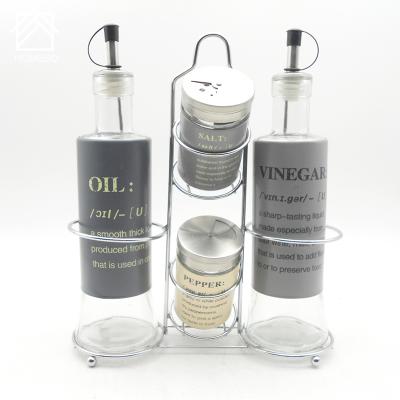 China Stocked Salad Dressing Glass Bottle Set Oil Dispenser with Stand and Condiment Serving Bottle Metal Base Lid for sale