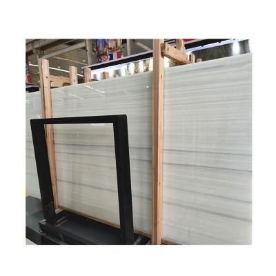 China Modern High Quality Polished Wood Veins White Onyx Marble Slab Price for sale