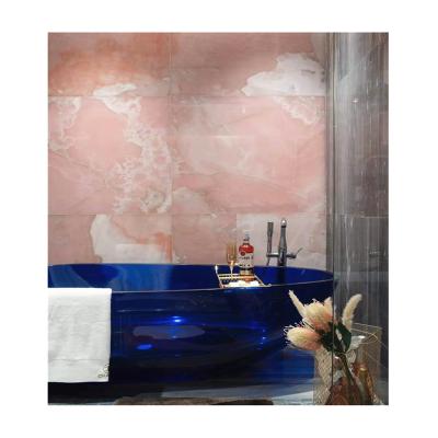 China Modern Backlit Wall Panel Pink Onyx Stone Wall Tiles Price for sale