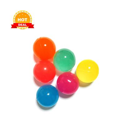 China Toy Wholesale Attractive Transparent Red 32mm Custom Rubber Hopping Hopping Custom Bouncy Balls for sale