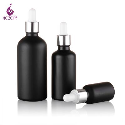 China 30Ml 50Ml Dropper Private Label Glass Cosmetic Packaging Black Plastic Bottle With Gold Lid for sale