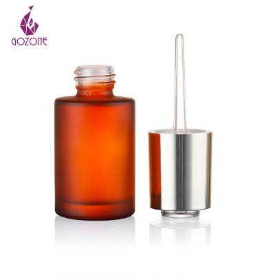 China Hair Oil Cosmetic Cylinder 30Ml Amber Flat Shoulder Frosted Clear Custom Glass Dropper Bottle for sale