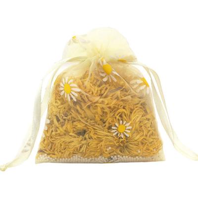 China Recyclable Small Fresh Daisy Bouquet Creative Mesh Bag Jewelry Item Storage Bag Drawstring Gift Bag for sale