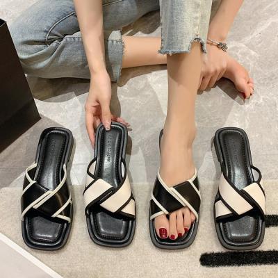 China Summer 2022 fashion trend sandals Roman flat women's institut of statistics new fashion band cross shoes simple retro beach casual shoes for sale