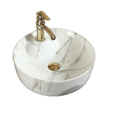 China Modern Natural Stone Art Ceramic Wash Basin, Newest Italian Ceramic Vessel Sink Bathroom Sink Carrara White Cabinet for sale