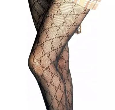 China Sexy Pantyhose Stockings Fishnet Thigh Highs Silk Stockings Breathable Net Black Nylon Stockings For Women for sale