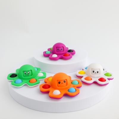 China Autism Decompression Trigger Bubble Busy Person Finger Gyro Sensory Toys Change Faces Spinners Reversible Flip Octopus Kids for sale