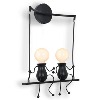 China Modern Nordic modern art light E27 mini living room black human wall lamp for kids bedroom for sale