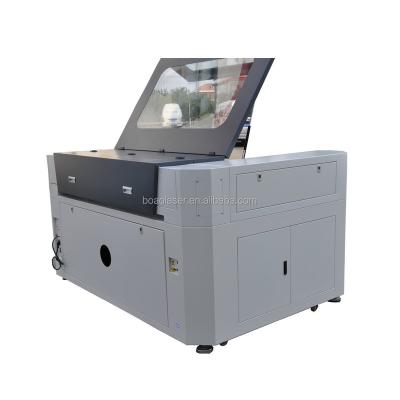 China Laser Engraving Compact Design CO2 Laser Cutter Engraver With 900x600mm Cutting Size for sale