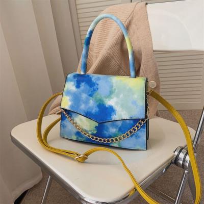 China 2021 Fashion hot sale rainbow graffiti link and dye women handbag cross - shades and body bags purses for ladies for sale