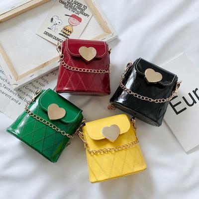 China Fashion 2021 Cheap Designers PU Kids Purses And Handbags For Kid for sale