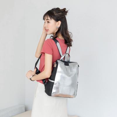 China 100% Eco-friendly Fashion PU Backpack Fashion Personality Silver Reflective Bags 2022 Small Women for sale