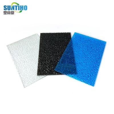 China 100% Waterproof UV Coated Clear Polycarbonate Sheet Diamond Solid PC Embossed Sheet for sale