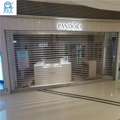 China Soundproof High Quality Transparent Clear Polycarbonate Roller Shutter Door for sale