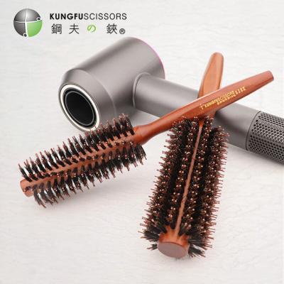 China Kungfu round hair brush use multiple hairstyles and new design hair comb for sale