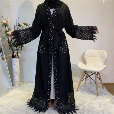 China Middle East 2021 fashion new beading lace with pockets cardigan arabic muslim long dress 7328 for sale