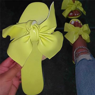 China 2021 New Trend Fashion Summer Bow-knot Flat Bottom Large Size Women's Slippers for sale