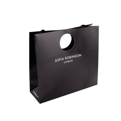 China Recyclable Luxury Custom Logo Gold Foil Printed Kraft Paper Packaging Shopping Bags for sale