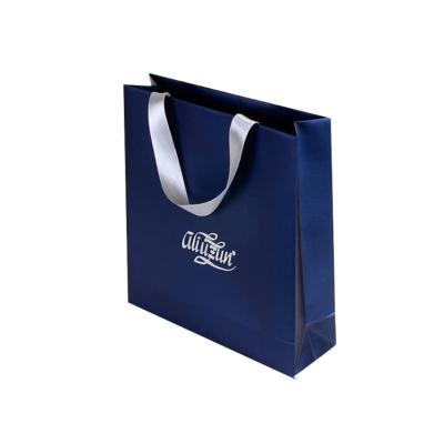 China Recyclable White And Twisted Brown Kraft Paper Handle Shopping Carrier Bag With Logo Printed Paper Bags Bulk for sale