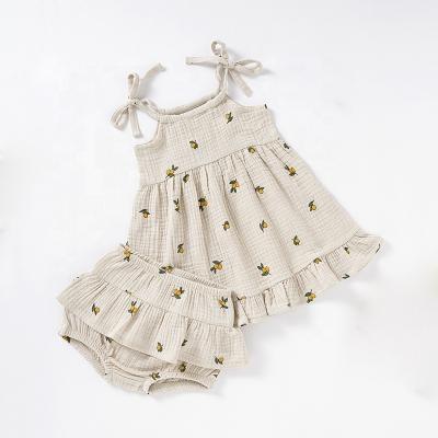 China Breathable Bow Knot Shoulder Lemon Print Organic Cotton Muslin Baby Girl Dress for sale