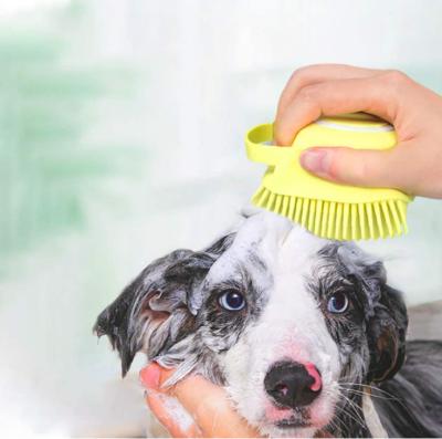 China Stocked 2 in 1 Soft Silicone Pet Massage Brush Dog Bathing Brush With Shampoo Dispenser for sale