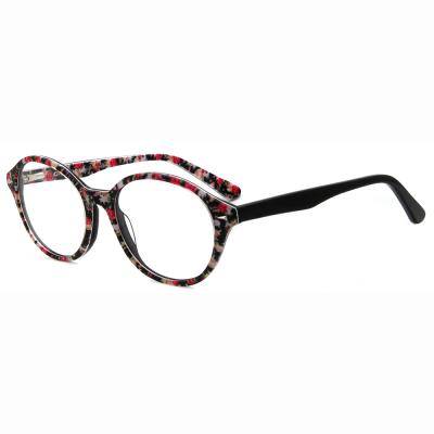 China Fashionable Women's Fashionable Optical Frame Women's Cat Eye Floral Decoration Frame Popular Novelty Plastic Optical Glasses for sale