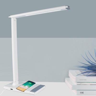 China Hot Multi Function USB Bedside Reading Table Lamp LED Desk Wireless Fill Wireless Light for sale