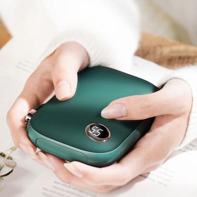 China Walmart Mini Handy Hand Warmer Portable Rechargeable 10000mah Lithium Battery Winter Warm Gift for sale