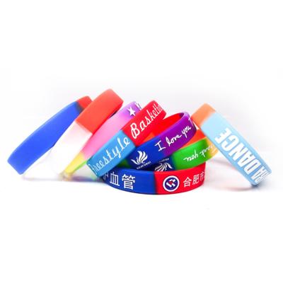 China Environmental Friendly Promotional Item Embossed Printed Silicone Wristbands Custom for sale