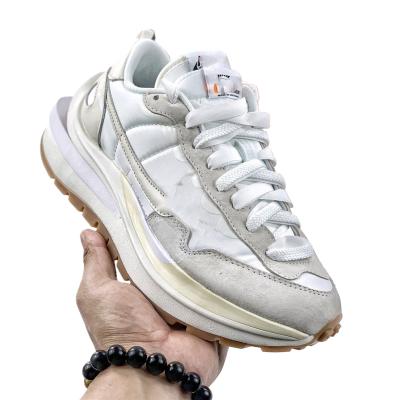 China Cushioning White Neutral Running Shoes To Increase Non - Slip Athletic Shoes for sale