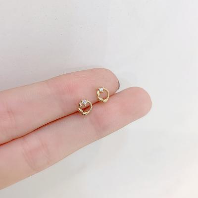 China CLASSIC Gold Covered Small Earlobe Earrings Round Female Simple Design Small Personality Earrings for sale