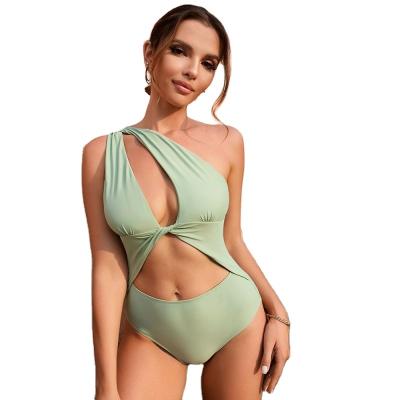 China Plus Size 2023 Sexy Bikini Set With One-Shoulder Hollow Out Solid Color One Piece Girls Swimwear Style for sale