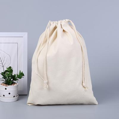 China Durable Hot Sale Reused Bag Logo Cotton Dust Drawstring Bags Custom Made Muslin Calico Canvas Drawstring Gift Pouch for sale