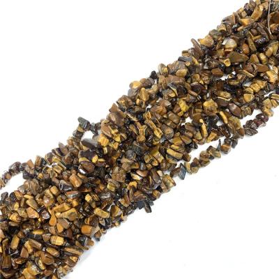 China Na Tiger Eye Chips Beads Yellow High Quality Wholesale Natural Gemstone 34 Inch Chips Beads for sale