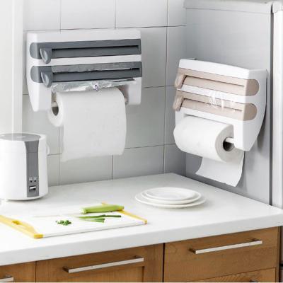 China Sustainable Multi-function Kitchen Paper Towel Holder Shelf Spice Storage Rack Plastic Wrap Cutting Cling Film Cutter for sale