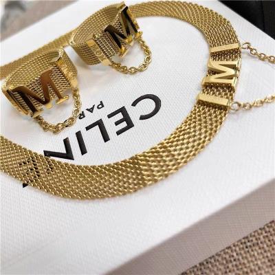 China FASHIONABLE Latest Design Titanium Steel 18k Gold Plating M Letter Pendant Necklace Ring Set for sale