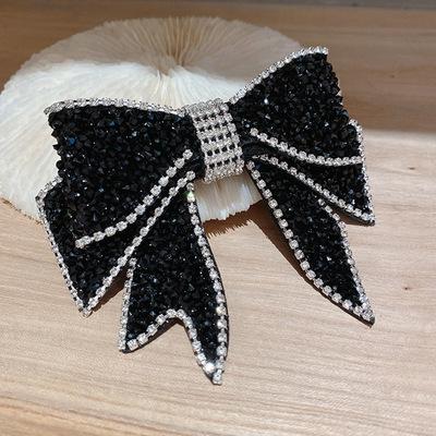 China Fashion factory direct full diamond glitter crystal hair clips shape women bow hairpin for sale