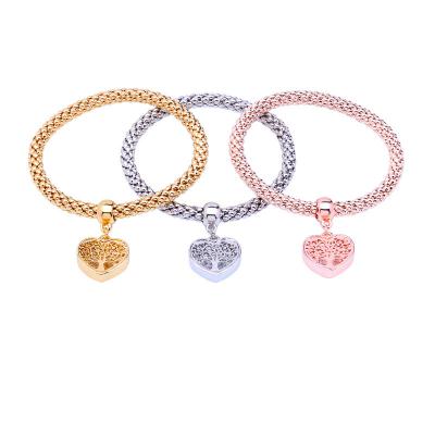 China 3pieces/set CLASSIC Shape New Elastic Bracelets Crystal Peach Heart Wire Tree Life Bracelet for sale