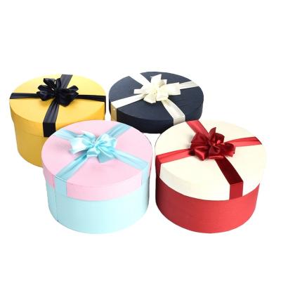 China Recycled Materials Gift Box Package Paper Box Ribbon Decoration Custom Flower Box for sale